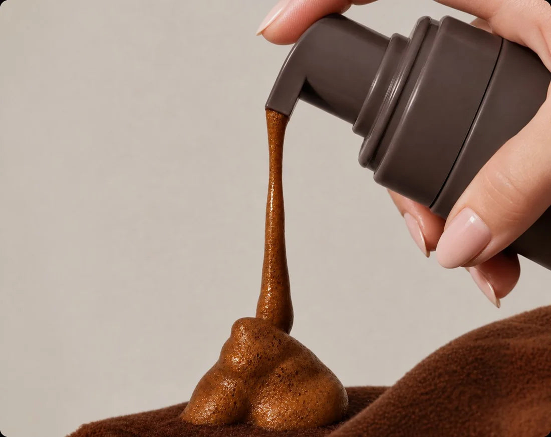 SUNKIS mousse being pumped onto a tanning mitt
