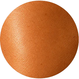 Close-up of a warm, golden-orange skin tone with natural texture